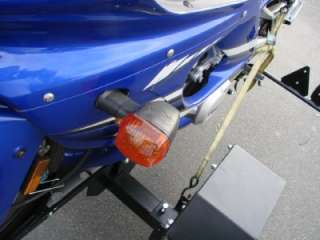 ride also featured on this trailer is an adjustable wheel stop which 