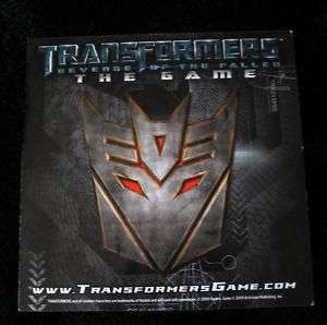 TRANSFORMERS THE GAME REVENGE OF THE FALLEN MAGNET NYCC  