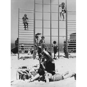  Climbing Frames on the Beach and a Family on Holiday in Warnemunde 