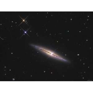  is an Edge On Unbarred Spiral Galaxy in the Constellation Ursa Major 