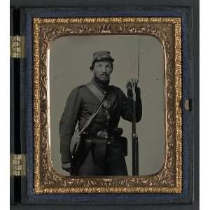   in Company H,Vermont uniform with bayoneted musket