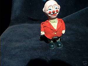 ANTIQUE, WIND UP TOY, CLOWN  TIPPING HAT, SPINNING CANE  