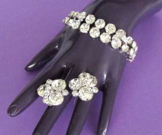   Swarovski prong set rhinestones and accented with lacey pave