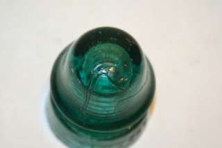 You are bidding on a vintage Brookfield Glass Insulator. It is a 