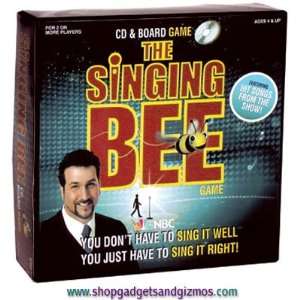    The Singing Bee Board Game with Enclosed Music CD Toys & Games