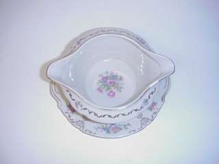 and purple floral sprigs this gravy boat measures 7 2 8 long by 6 5 8 