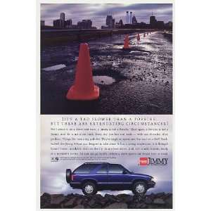  1995 GMC Jimmy Tad Slower Than Porsche Potholes Print Ad 