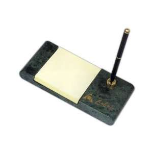   desk memo pad holder with adhesive note pad and pen.