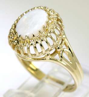   this is a lovely opal and 10k yellow gold ring measuring 5 8 inch long