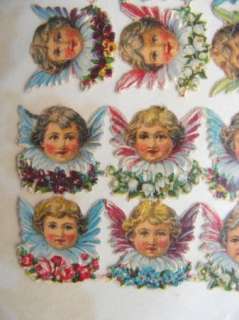 vintage diecut paper scrap tiny FLYING ANGEL FACES victorian floral 