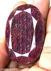 415 CTS CARVED GLASS FILLED ENHANCED RUBY STRAND  