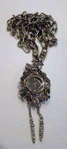 From an estate, an adorable vintage marcasite cuckoo clock watch 