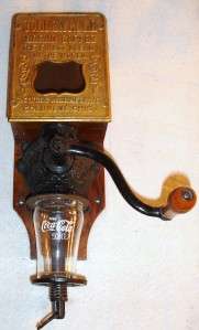   THIS VINTAGE ANTIQUE GOLDEN RULE WALL MOUNTED COFFEE MILL OR GRINDER