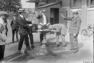 early 1900s photo 4 men near drinking fountain in par  