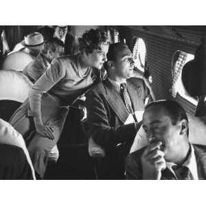  Joan Fontaine and Brian Aherne on an Airplane on Their Way 