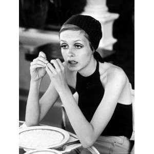  British Fashion Model Twiggy with Slumpy Posture, at Table 