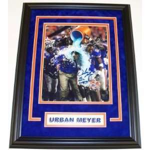 Urban Meyer Autographed Picture   with 06 NAT CHAMPS Inscription 
