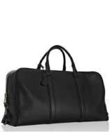 Tom Ford black leather oversized travel duffel bag vs. Stuart Weitzman 